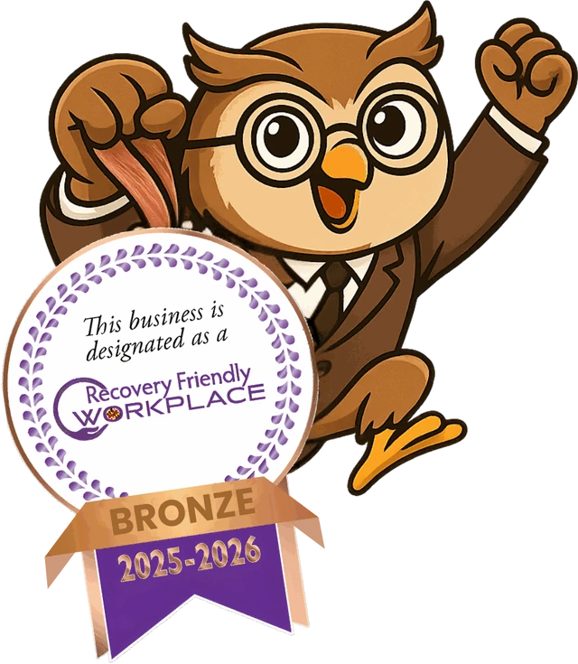 Oden, the OW.L mascot, holding a seal reading: This business is designated as a Recovery Friendly Workplace.
